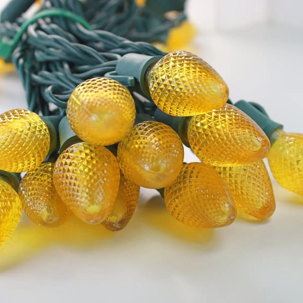 25-light C7 Yellow LED Christmas Lights, 8" Spacing Green Wire